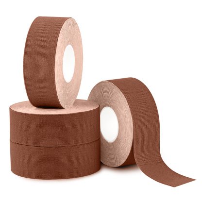 Tan skin-tone kinesiology tape for low-visibility applications