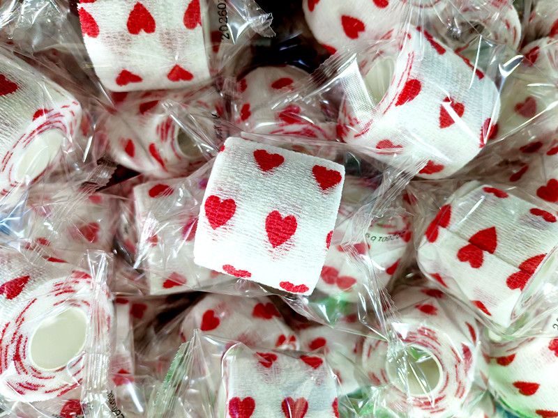 White bandage with red heart print vet wrap sample
