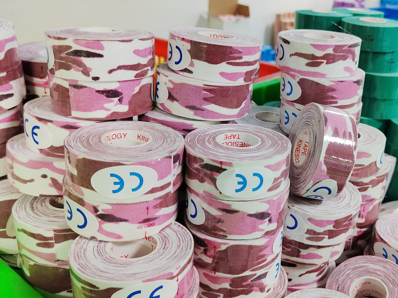 {"default":"a lot of pink camo kinesiology  tape in factory"}

